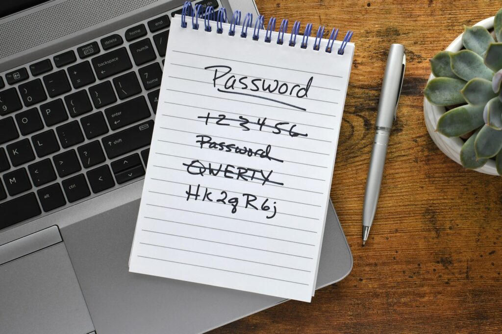 10 tips for securing online privacy - List of passwords on a notebook